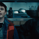 Joel (Evan Marsh), holding an axe, and Carrie (Amber Goldfarb) hide from a group of serial killers in Vicious Fun.